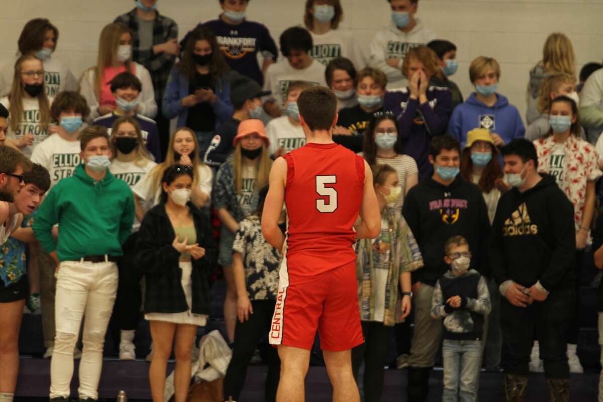 Benzie Central's Nate Childers prepares to shoot a free throw in front of Frankfort's student section. 