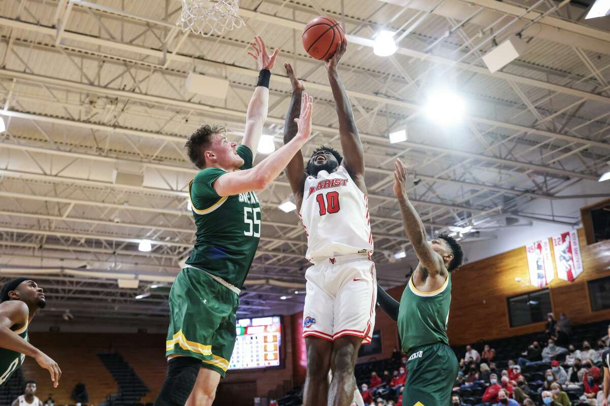 Marist's Jao Ituka puts up a shot against Siena's Jackson Stormo during their game Friday, Jan. 14, 2021.