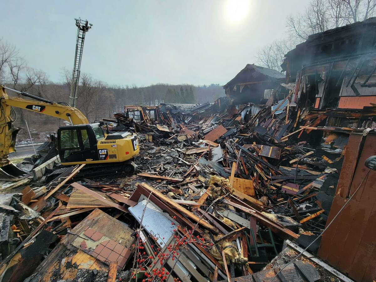 The Newtown Hook & Ladder, along with four other Newtown fire departments, were called to a fire at a vacant commercial building on Mount Pleasant Road around 9:30 a.m. Friday. Fire officials said the building, which was a former restaurant and pub, was completely destroyed.