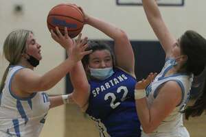 Action from the Triopia girls' basketball team's win over North Greene in the North Greene Lady Spartan Classic Thursday night