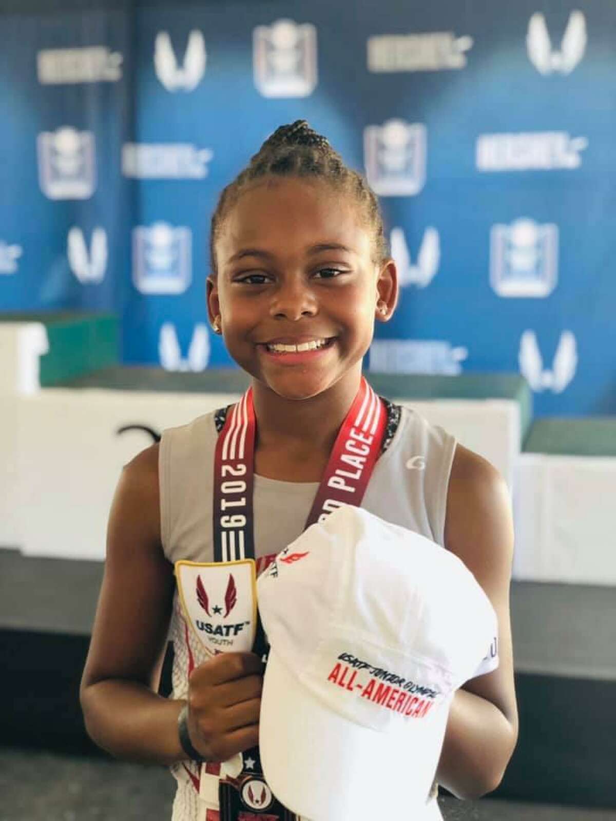 Northwest Flyers Track Club member Jayda Runnels placed third overall in the triathlon at the 2019 Junior Olympics, her first year competing in the event.
