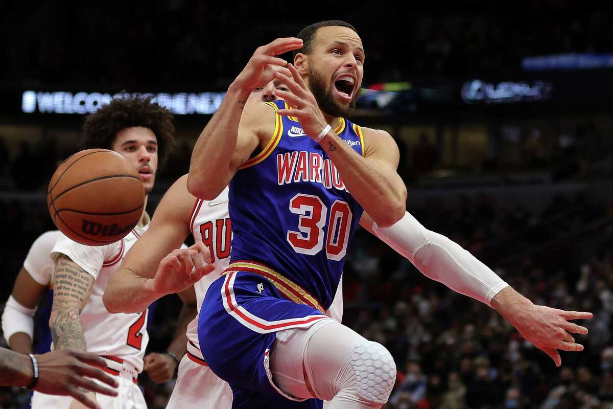 Stephen Curry of the Golden State Warriors loses the ball during the second half of a game against the Chicago Bulls at United Center on Friday night.