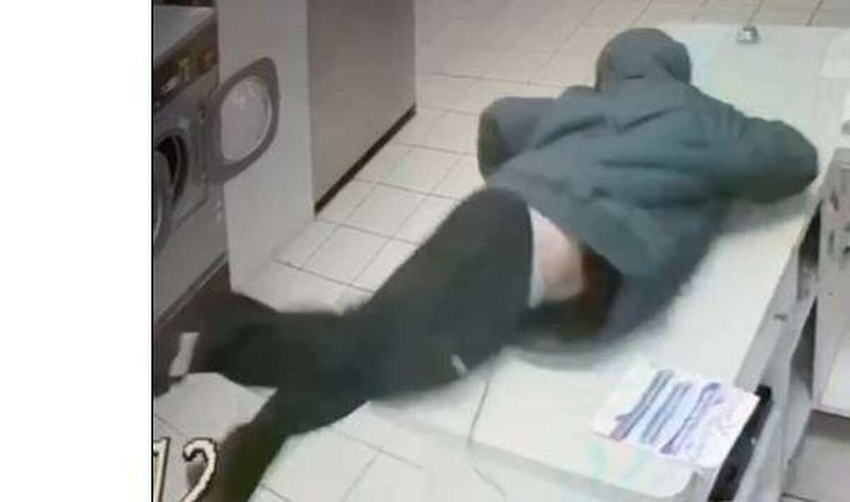 Police are looking for this suspect who robbed the EZ Wash Laundromat on Foxon Road around 8 p.m. Friday.
