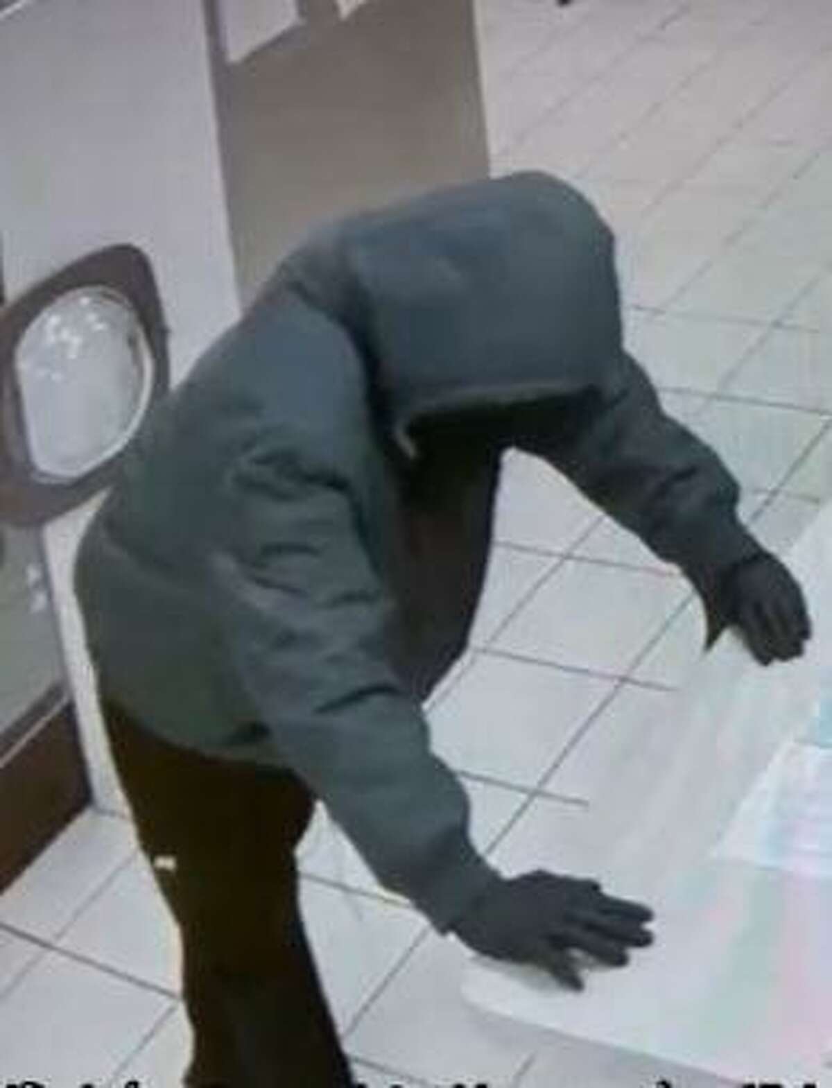 Police are looking for this suspect who robbed the EZ Wash Laundromat on Foxon Road around 8 p.m. Friday.