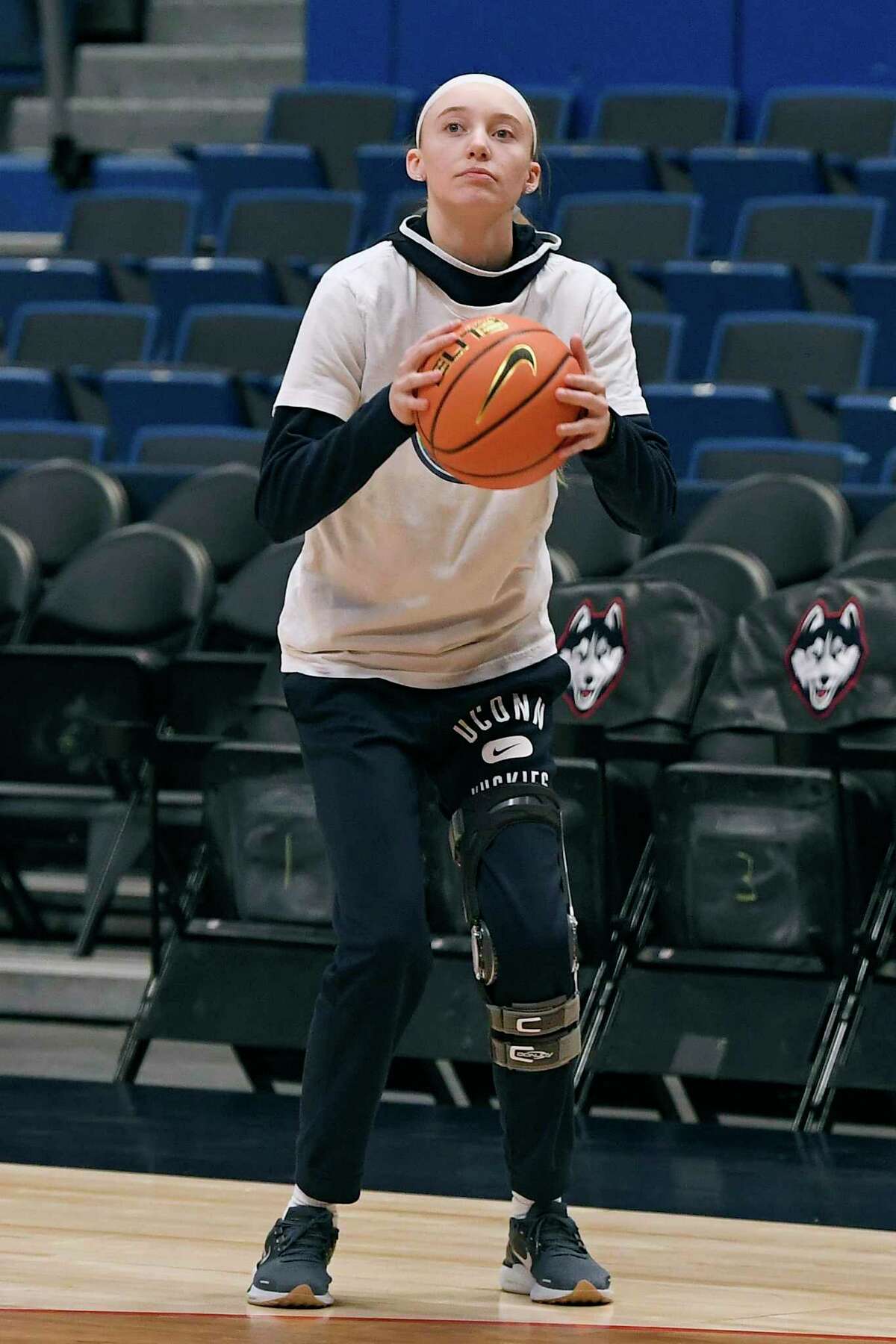 Off crutches, UConn’s Paige Bueckers shoots prior to Saturday’s game against Xavier.