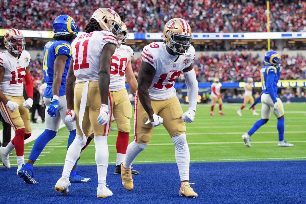 San Francisco 49ers wide receiver Deebo Samuel (19) reacts on his touchdown during an NFL football game against the Los Angeles Rams Sunday, Jan. 9, 2022, in Inglewood, Calif. (AP Photo/Kyusung Gong)