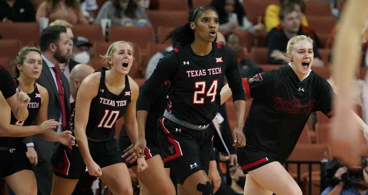 Texas Tech forwards Taylah Thomas (24), Bryn Gerlich (10) and teammates celebrate a score against Texas during the first half of an NCAA college basketball game, Wednesday, Jan. 5, 2022, in Austin, Texas. (AP Photo/Eric Gay)