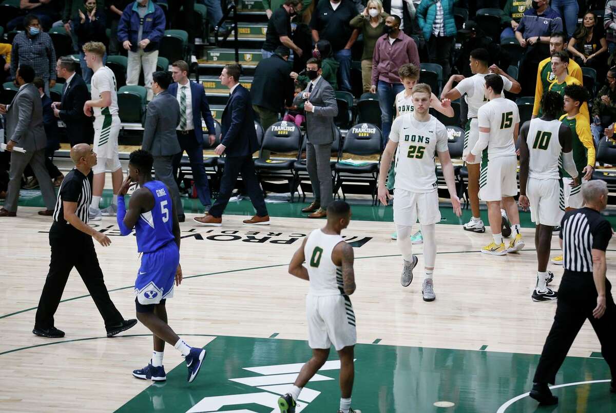 University of San Francisco Dons leave the court after the NCAA men’s basketball game against the Brigham Young University Cougars at Memorial Gym, Saturday, Jan. 15, 2022, in San Francisco, Calif.