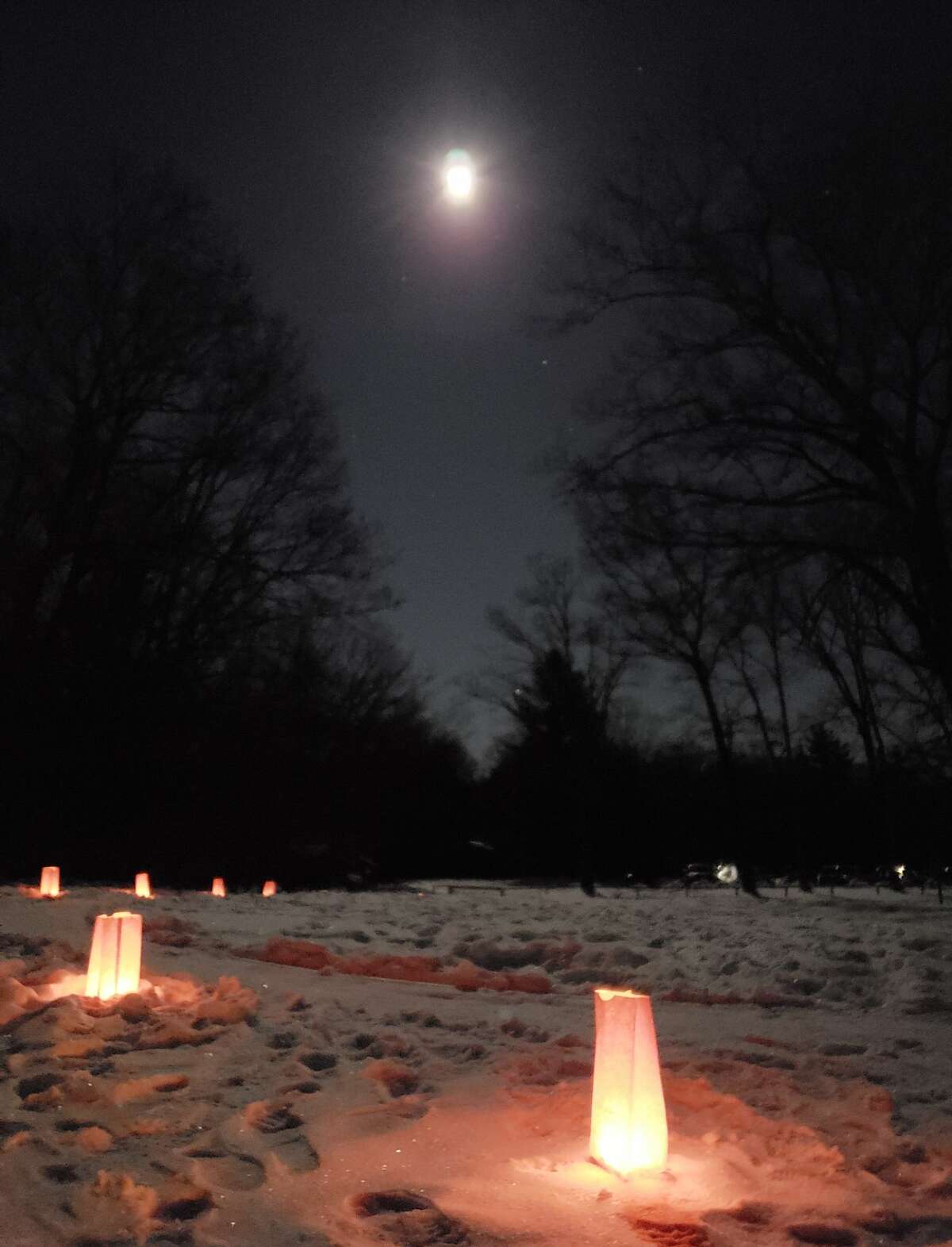 About 15 people turned out for the moonlight winter sports at Big M, crunching up the paper lantern lit pathways to a warm fire and chat with fellow outdoor enthusiasts near Wellston on Saturday night.
