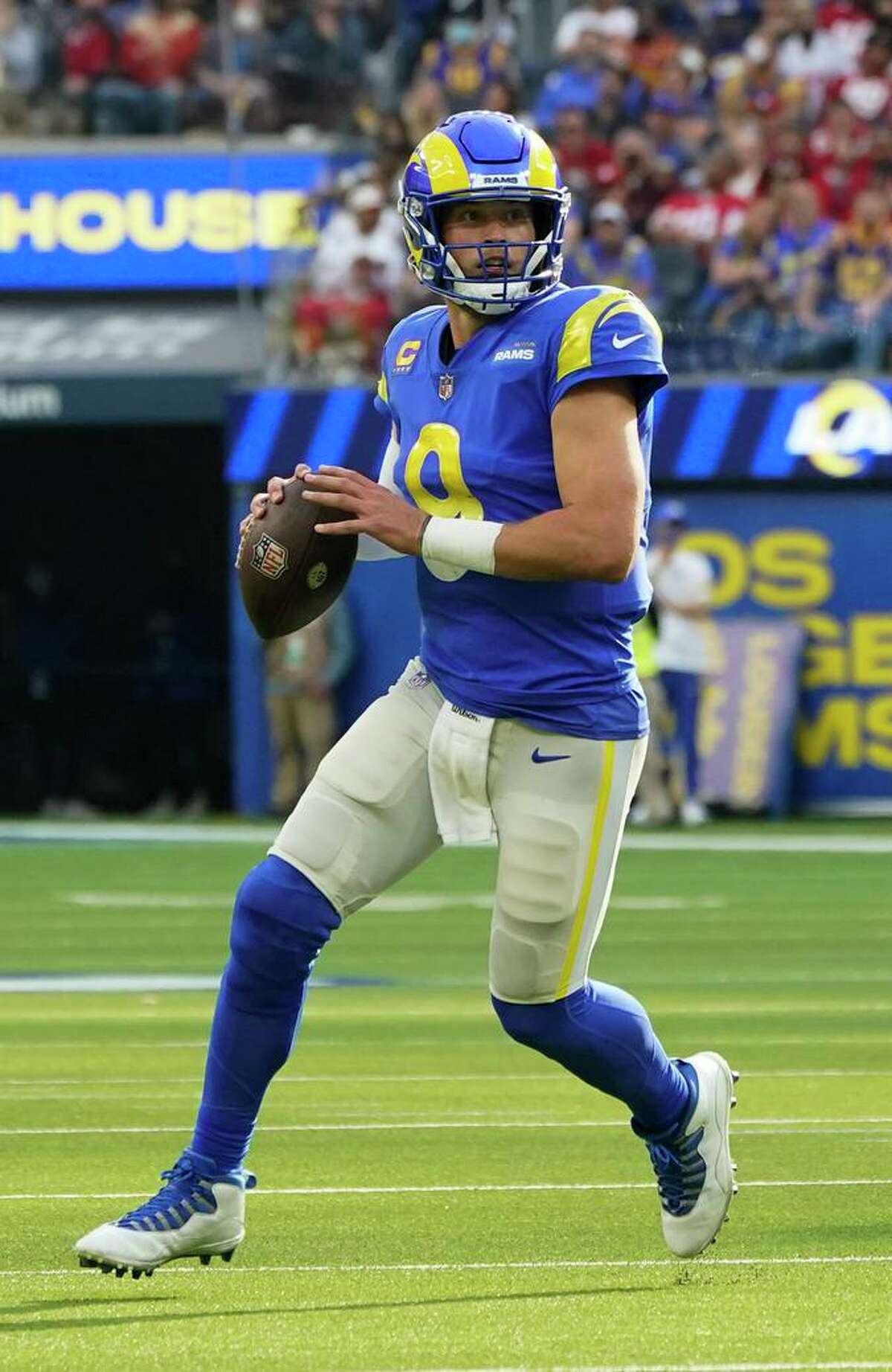 Los Angeles Rams quarterback Matthew Stafford (9) looks for a receiver during an NFL football game against the San Francisco 49ers Sunday, Jan. 9, 2022, in Inglewood, Calif. (AP Photo/Marcio Jose Sanchez)