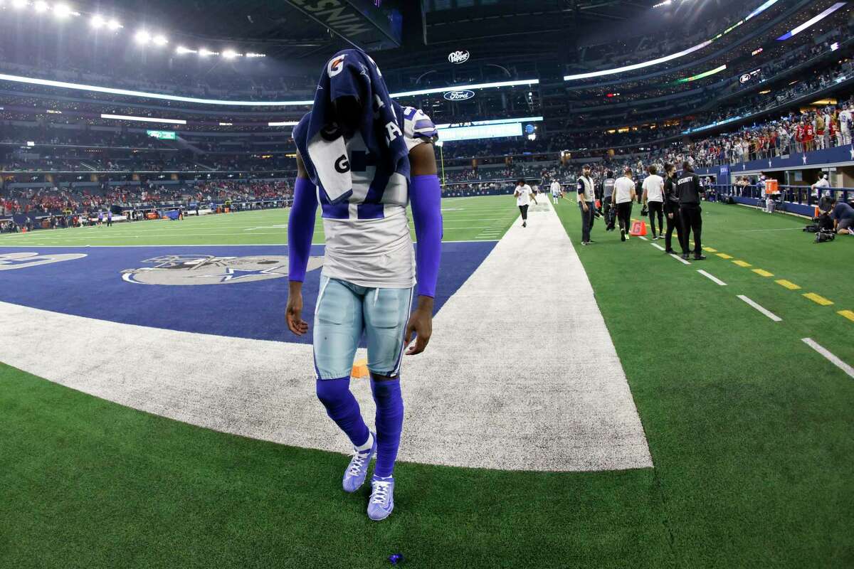 Dallas Cowboys safety Jayron Kearse (27) walks off the field after their NFL wild-card playoff football game against the San Franciso 49ers in Arlington, Texas, Sunday, Jan. 16, 2022. (AP Photo/Ron Jenkins)