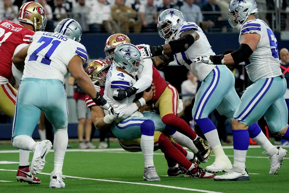 Cowboys quarterback Dak Prescott (4) took five sacks in Saturday’s wild-card playoff loss to the 49ers on Saturday in Arlington.