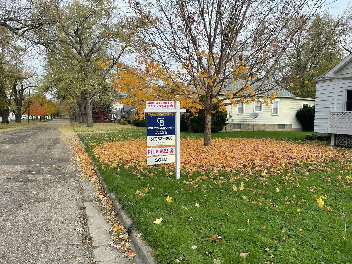 A house for sale is pictured in Holt. The community 8 miles south of Lansing is rated as most affordable in a recent study of Michigan small cities.