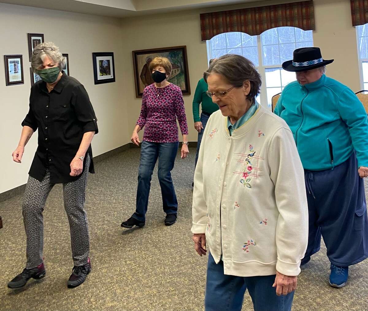 Residents at Candlestone Assisted Living recently got a line dancing lesson from Greater Midland Community Center instructor Linda Graf, who is at the far left in this picture.