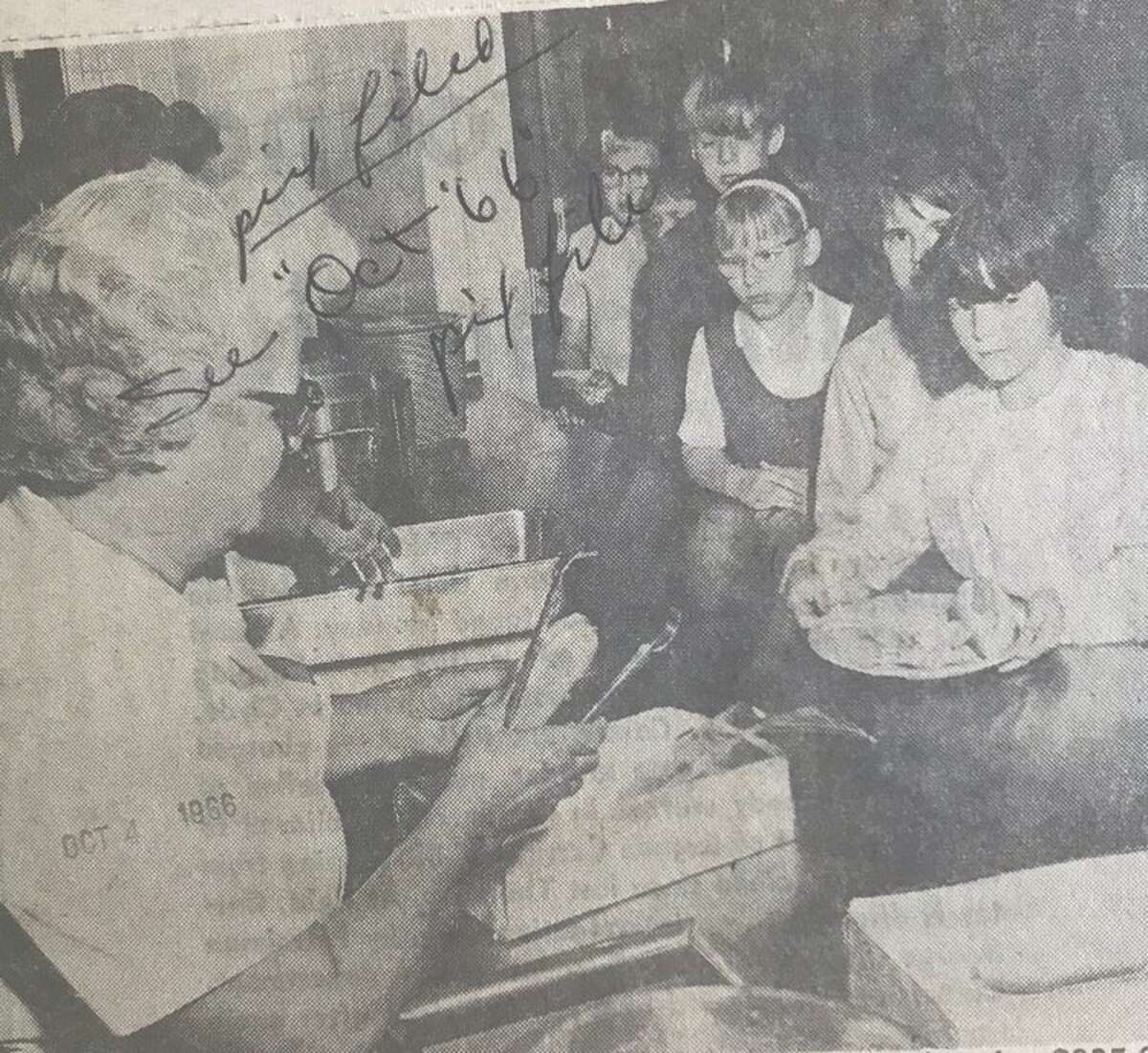 Pine River Elementary School opens its cafeteria serving hot lunches to about 200 students. The classrooms opened for use Sept. 6 but construction delays hindered the serving of hot lunches. Mrs. Walter Miller and Mrs. Joseph Pavka serve the lunches. The hot lunch program would start the next week at the new Floyd Elementary School. October 1966