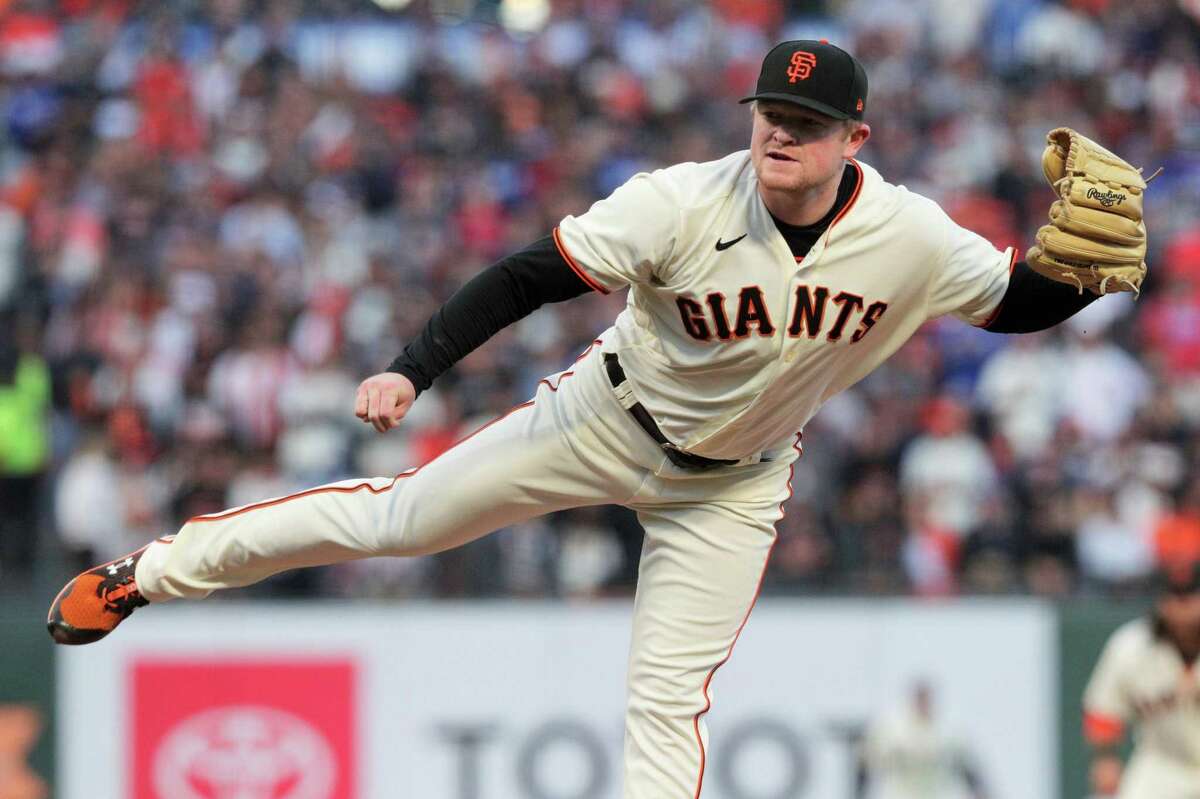 San Francisco Giants starting pitcher Logan Webb (62) throws during the top of the first inning as the San Francisco Giants played the Los Angeles Dodgers in Game 5 of the National League Division Series at Oracle Park in San Francisco, Calif., on Thursday, Oct. 14, 2021.