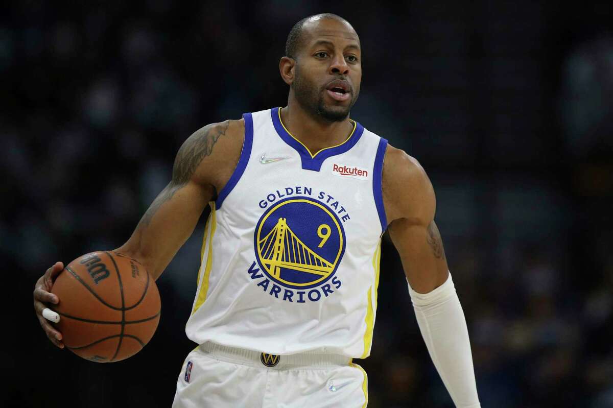 Golden State Warriors forward Andre Iguodala (9) handles the ball during the second half of an NBA basketball game against the Minnesota Timberwolves, Sunday Jan. 16, 2022, in Minneapolis. Minnesota won 119-99. (AP Photo/Stacy Bengs)
