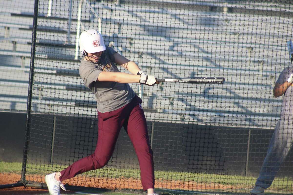 A returner off the state championship team, Madison Applebe takes her first official swings of the new season Friday afternoon. She blasted a home run for one of her hits.