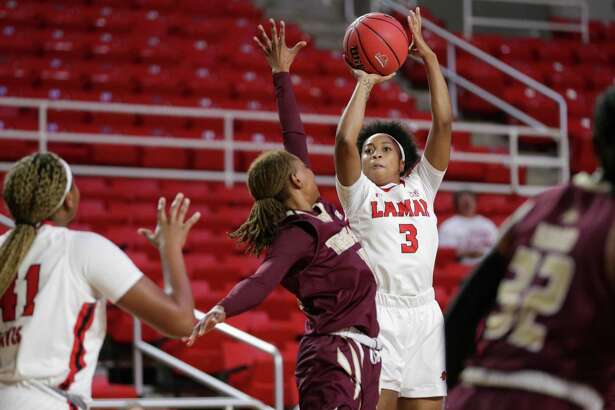 Lamar Cardinals guard Sabria Dean (3) shoots over the bobcat defense at the Montagne Center in Beaumont, TX. Photo taken December 10, 2021 by Jarrod Brown
