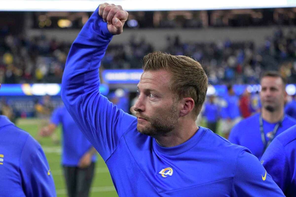 Los Angeles Rams head coach Sean McVay gestures toward fans after the Rams defeated the Arizona Cardinals in an NFL wild-card playoff football game in Inglewood, Calif., Monday, Jan. 17, 2022. (AP Photo/Marcio Jose Sanchez)