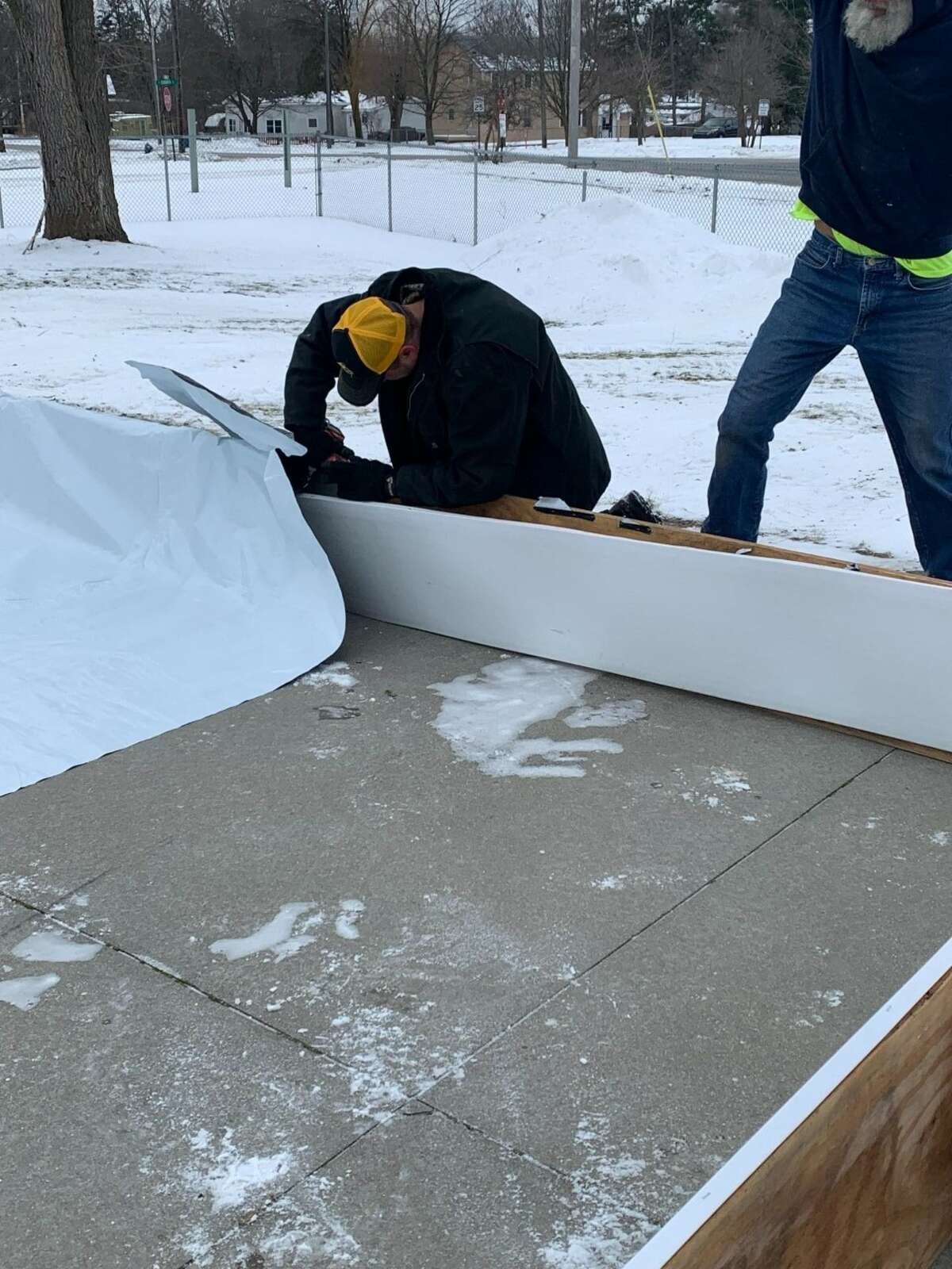 Evart DPW workers have installed the ice skating rink at the Skate Park on River Street and it is now open for skating.