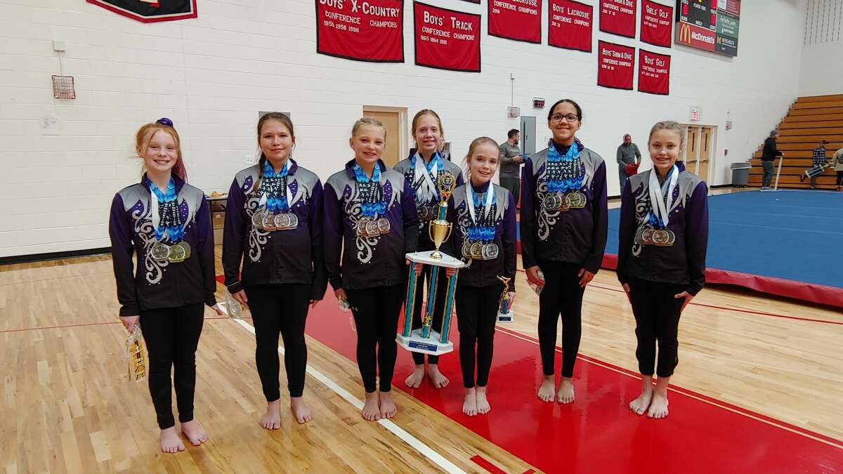 The Xcel Silver team brought home first place honors at the Winter Classic. (From left to right: Grace Hasenbank, Annika Heemstra, Sydney Morrissey, Sierra Surd, Ainsley Albrecht, Cara Siemiaszko, Jade Emick)