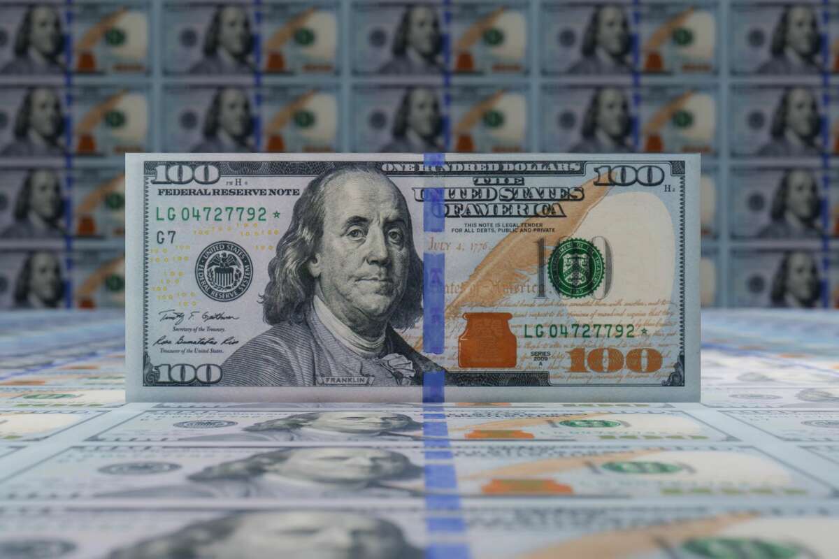 3D illustration of standing hundred dollar banknote. 