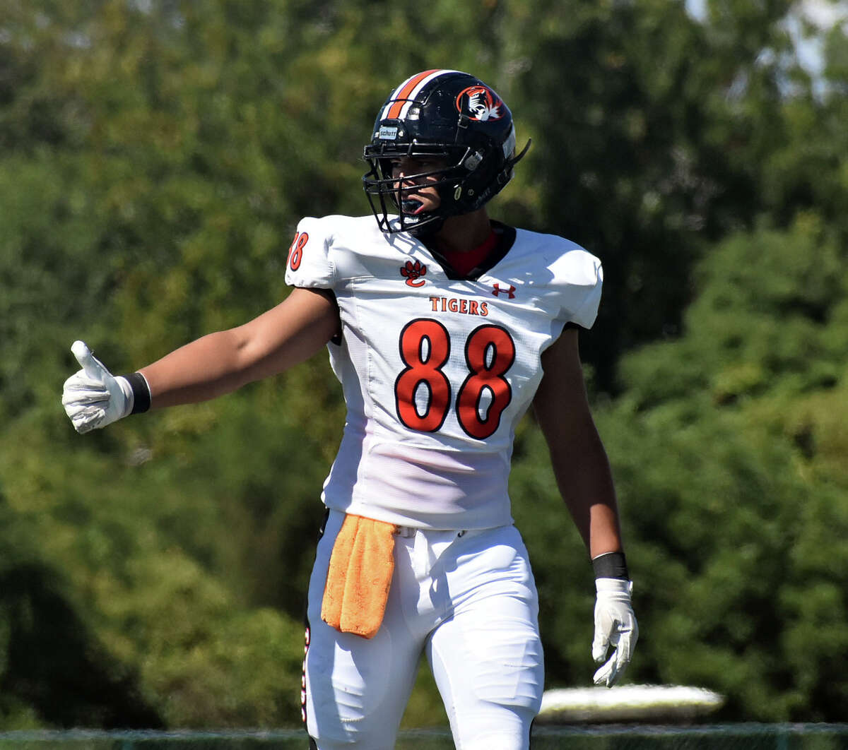 Edwardsville's Iose Epenesa lines up at tight end during a game against Belleville West in the 2021 season.