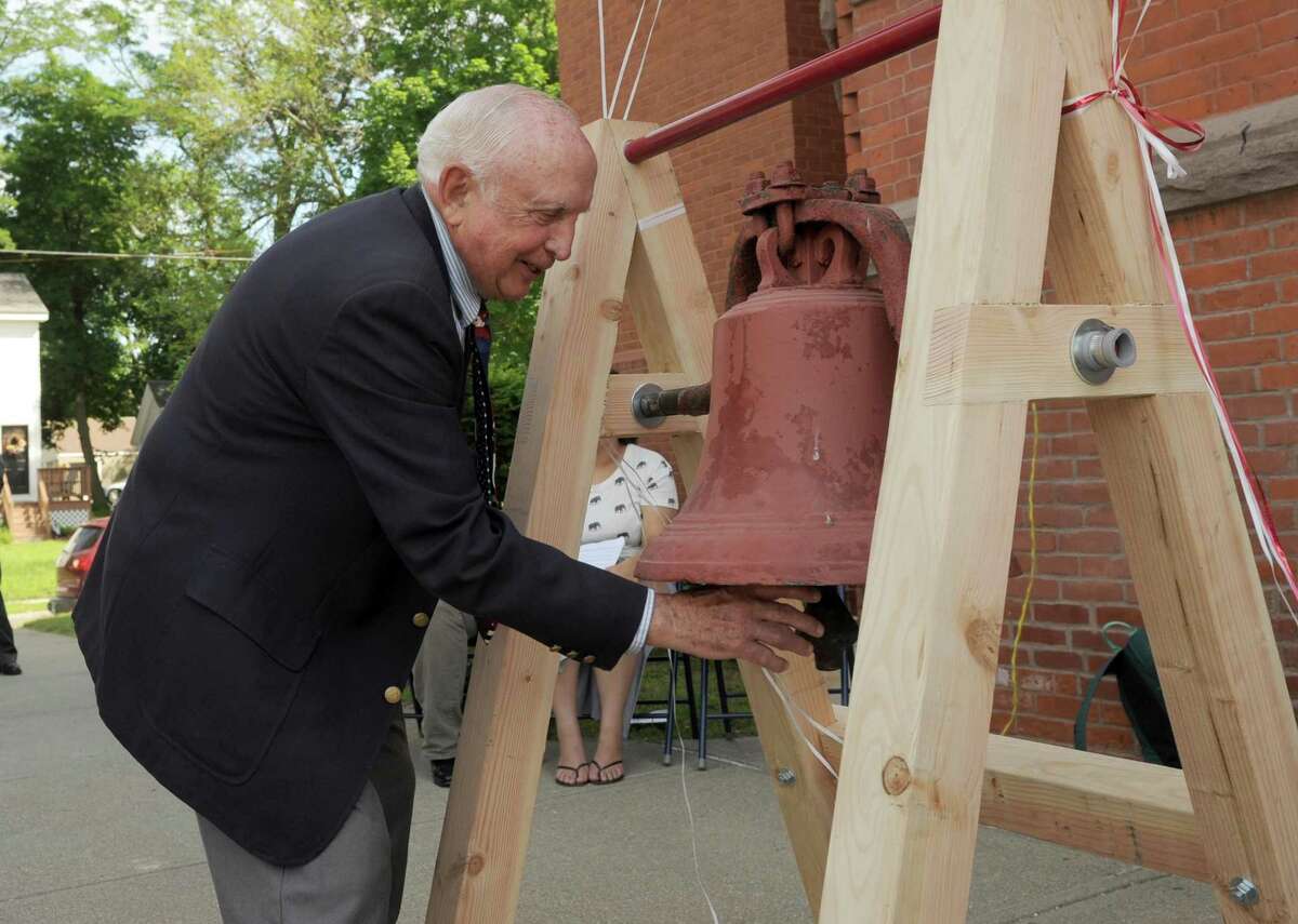 Joe Pepin, ACE's founding principal, rings the school bell during The Alternative Center for Excellence graduation ceremony at the school Monday morning, June 16, 2014. He died on Friday, Jan. 14 at 85.