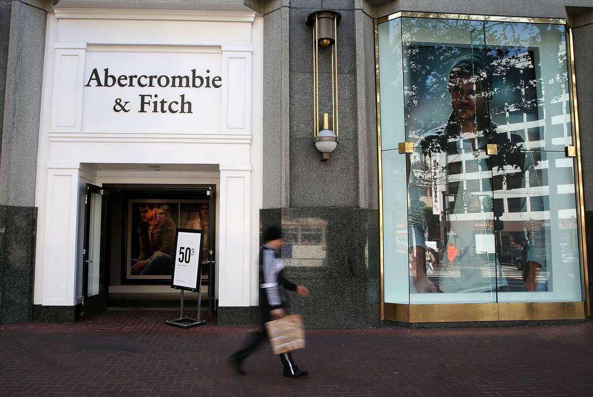 A pedestrian walks by an Abercrombie & Fitch store in San Francisco on Aug. 26, 2015.