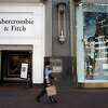 A pedestrian walks by an Abercrombie & Fitch store in San Francisco on Aug. 26, 2015.