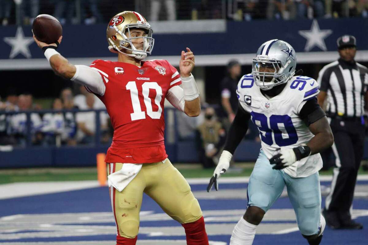 San Francisco 49ers quarterback Jimmy Garoppolo (10) is seen on the  sidelines during a wild card NFL football game against the Dallas Cowboys,  Sunday, Jan. 16, 2022, in Arlington, Texas. San Francisco