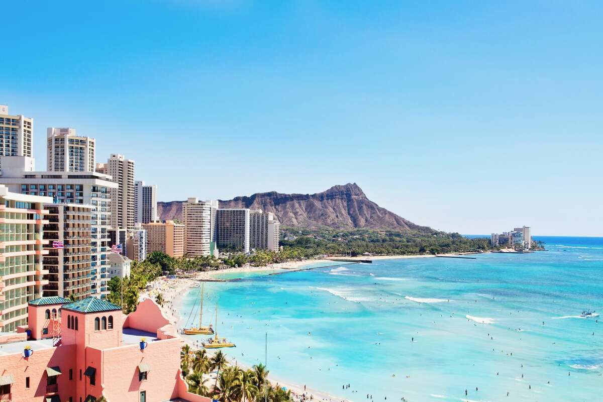 A photo of the Waikiki Beach and Diamond Head resorts in Oahu.