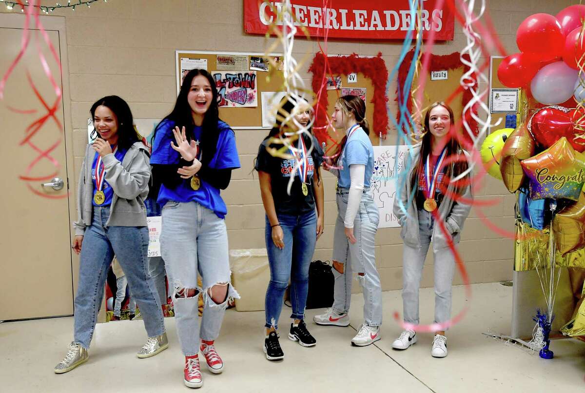 Lumberton High School varsity cheerleaders join in a celebration of their recent state championship win. It's earned them back-to-back trophies after taking the 2021victory. Photo made Tuesday, January 18, 2022 Kim Brent/The Enterprise