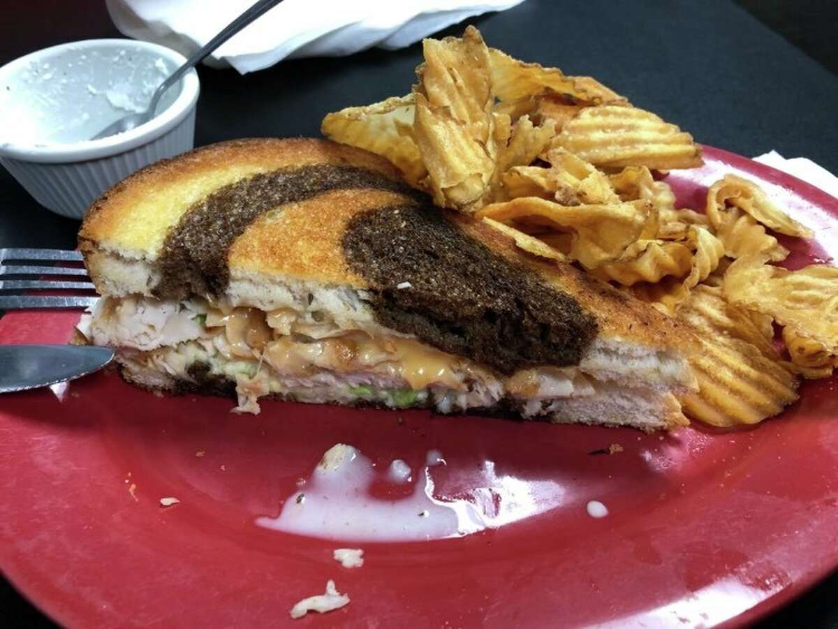 The turkey reuben sandwich at Lanny's Restaurant consists of coleslaw, turkey, swiss cheese and thousand island dressing.