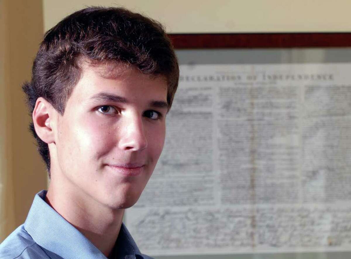 Documentary filmmaker Grant Radulovacki, 14, posed next to a copy of the Declaration of Independence at his Riverside home, Thursday, Sept. 23, 2010. Radulovacki produced a 26-minute film about the contribution Greenwich soldiers made to the Union's cause during the Civil War.