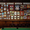 Local signage and photos represent Bay Area teams and beyond at The Final Final sports bar in the Marina /Cow Hollow District of San Francisco. 