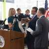 Caroline Simmons was ceremoniously sworn in as Stamford’s mayor by Attorney General William Tong at the Stamford Government Center on Dec. 1, 2021. She was joined by her husband, Art Linares, a former Republican state senator, and their sons Teddy, 3, and Jack, 1.