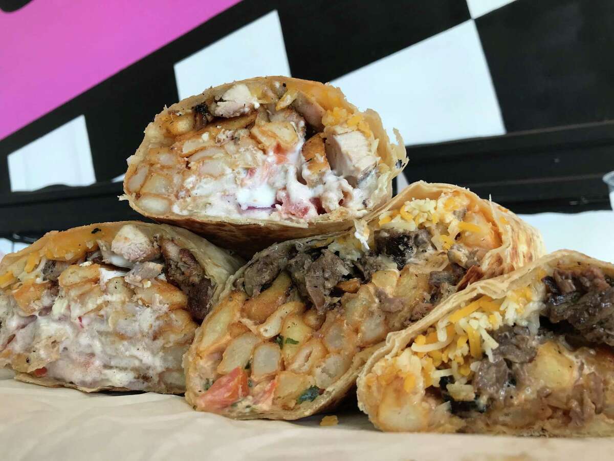 The Big Fat Greek Burrito (left) and California Burrito from Stuffed, a new restaurant specializing in jumbo, California-style burritos.
