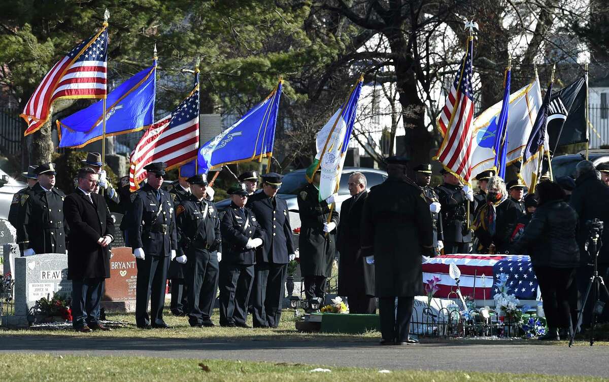 Police from different departments take part in the funeral of New Haven police Officer Diane Gonzalez at Evergreen Cemetery in New Haven Jan. 19, 2022.