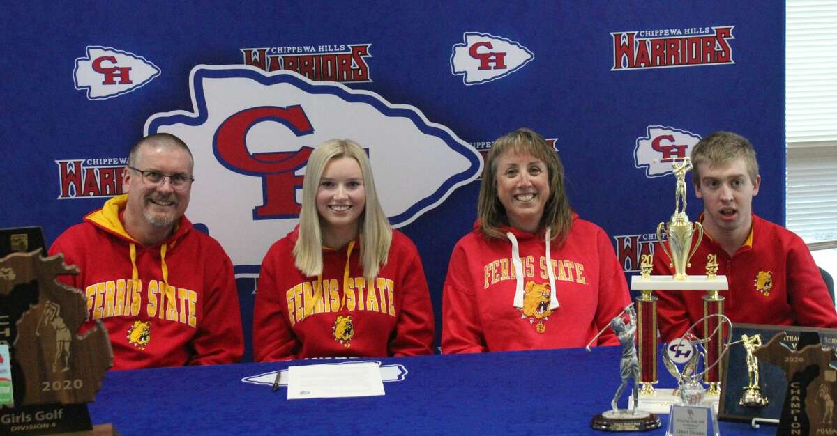 Chippewa Hills' Kerstin Stadtfeld (second from left) is join by her father John, mother Lisa and brother Josh during her signing ceremony on Wednesday to play golf at Ferris State.
