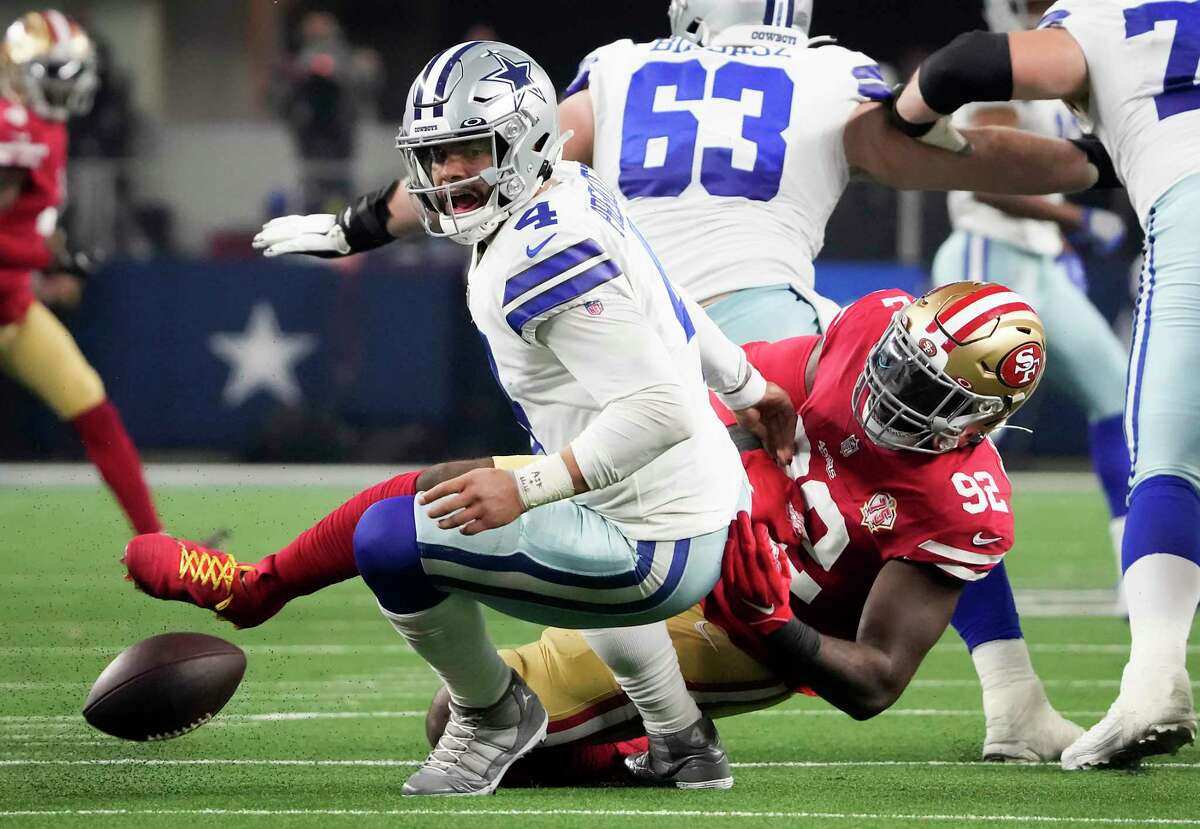 Dallas Cowboys quarterback Dak Prescott fumbles as he is sacked by San Francisco 49ers defensive end Charles Omenihu during the second half of Sunday’s game.