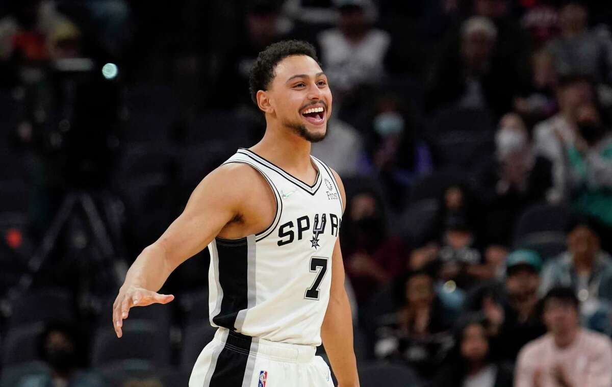 Spurs guard Bryn Forbes (7) reacts to a score against the Houston Rockets during the second half Wednesday, Jan. 12, 2022, in San Antonio.