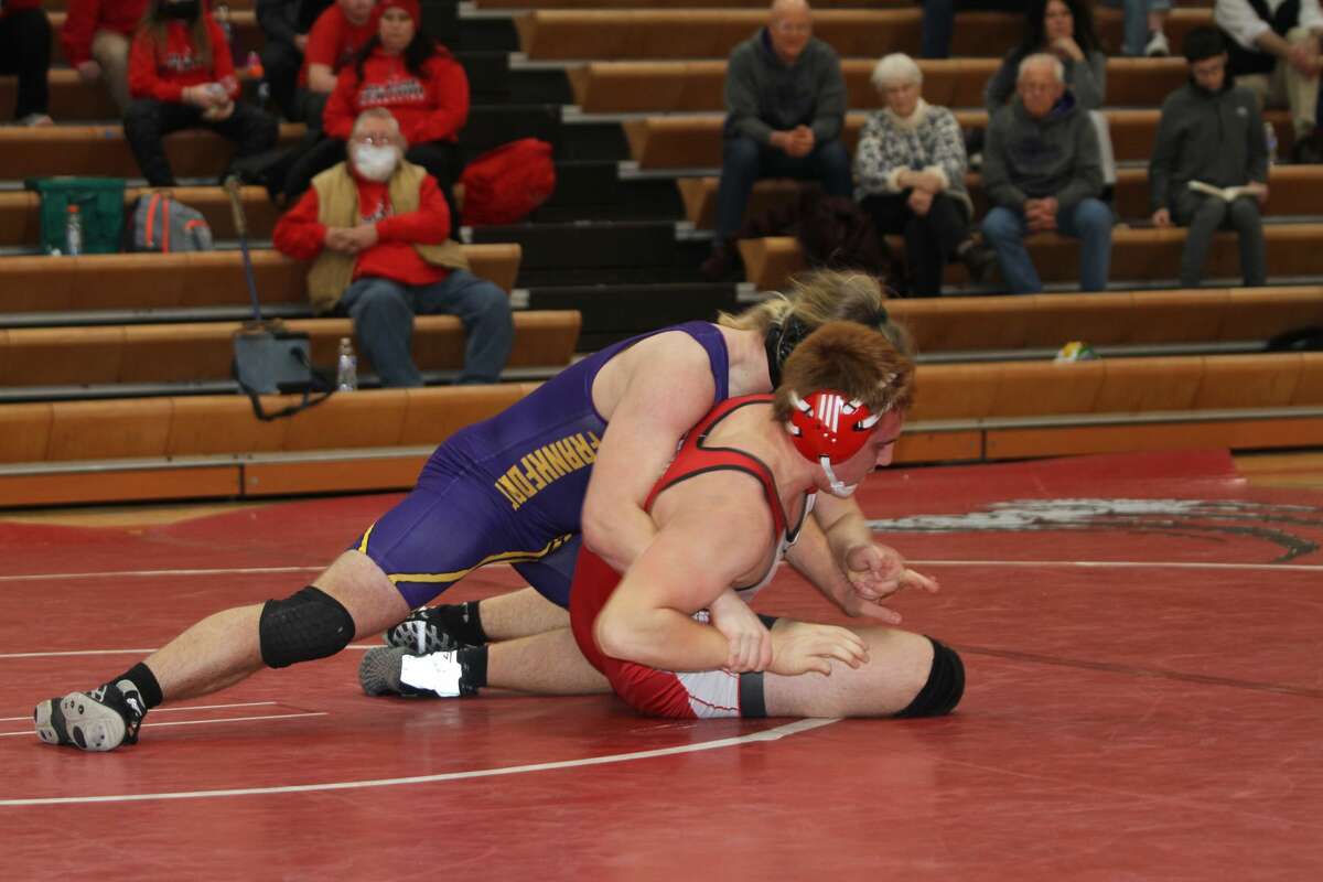 Frankfort's Fletcher Anderson successfully takes down Benzie Central's Hugo Laforet. 
