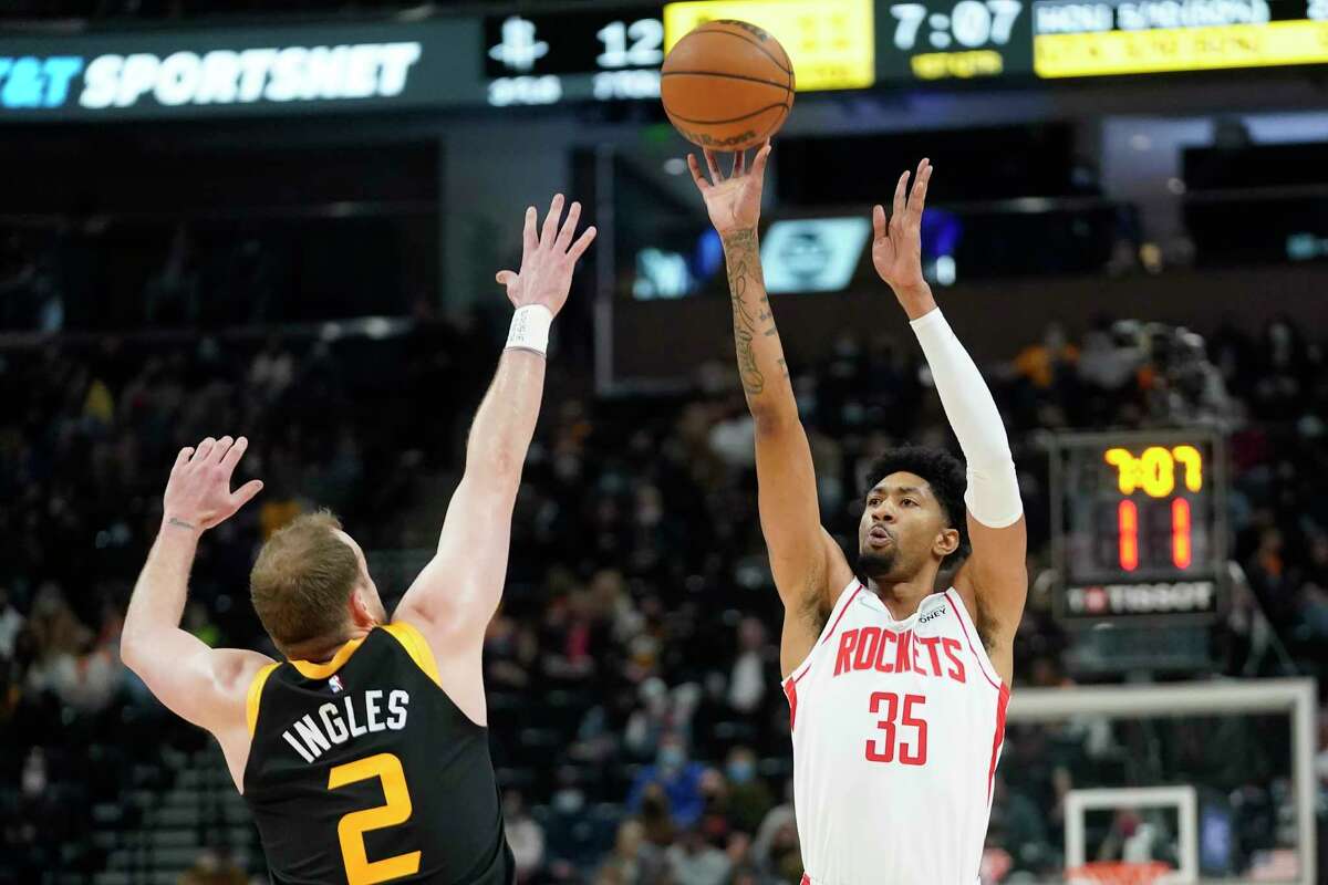 Rockets center Christian Wood (35) shoots over Jazz guard Joe Ingles. Wood finished with 13 points and was 3-of-6 from beyond the arc.