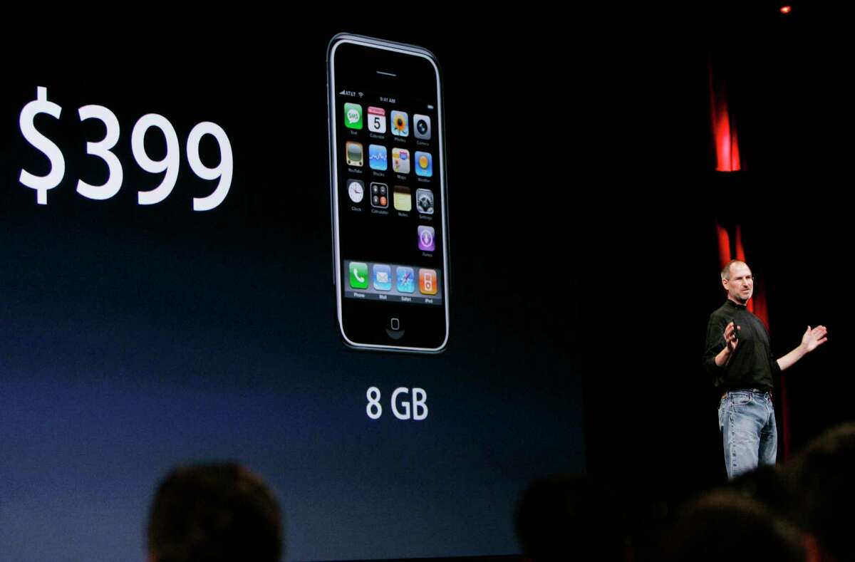 Apple CEO Steve Jobs announces in San Francisco, Wednesday, Sept. 5, 2007, that the 8GB iPhone will sell for $399.