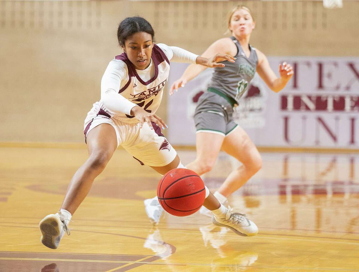 Texas A&M International University’s Kayla Presley goes after a loose ball during a game against Eastern New Mexico University.