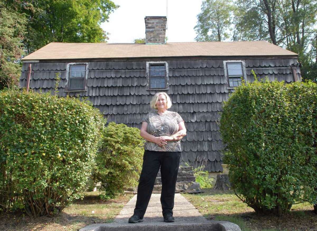 Ona Rae Ransom of Ramona, Calif., a descendant of the Lyon family, posed in front of the Thomas Lyon House on West Putnam Avenue and Byram Road, Friday afternoon, Sept. 24, 2010. Ransom was given a tour of the house by the Greenwich Preservation Trust.