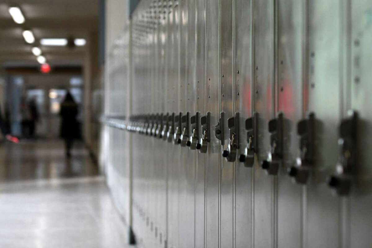 Hallway with lockers at Schenectady High School on Wednesday, Jan. 19, 2022, in Schenectady, N.Y. The school said a student was arrested May 5, 2022 after allegedly being found walking the halls in a ski mask with a BB gun that looked like a real handgun.