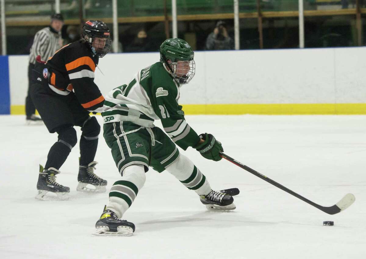 Shenendehowa's Nolan Sullivan takes the puck in to score against Bethlehem earlier this season. Sullivan scored twice in the Section II Division I title game against Adirondack on Tuesday, March 1, 2022.